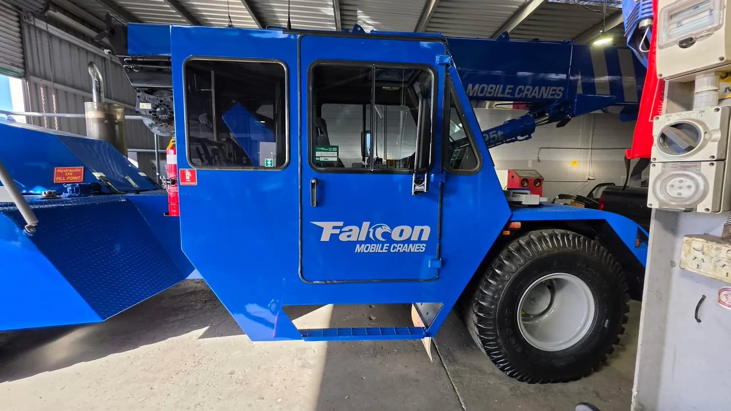 Blue Falcon mobile crane, cab and boom wrap