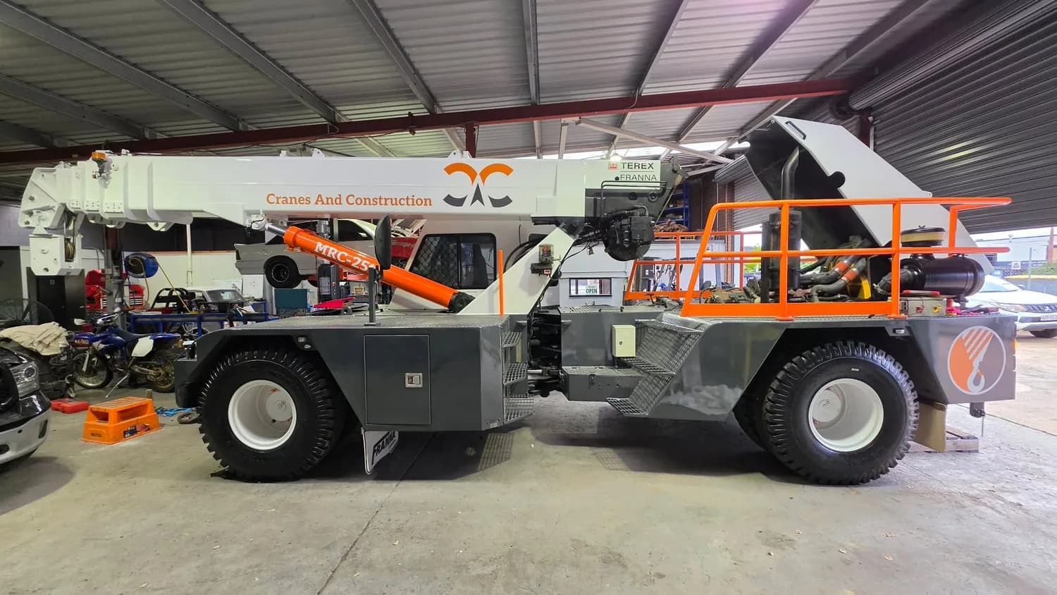 Cranes And Construction mobile crane in workshop