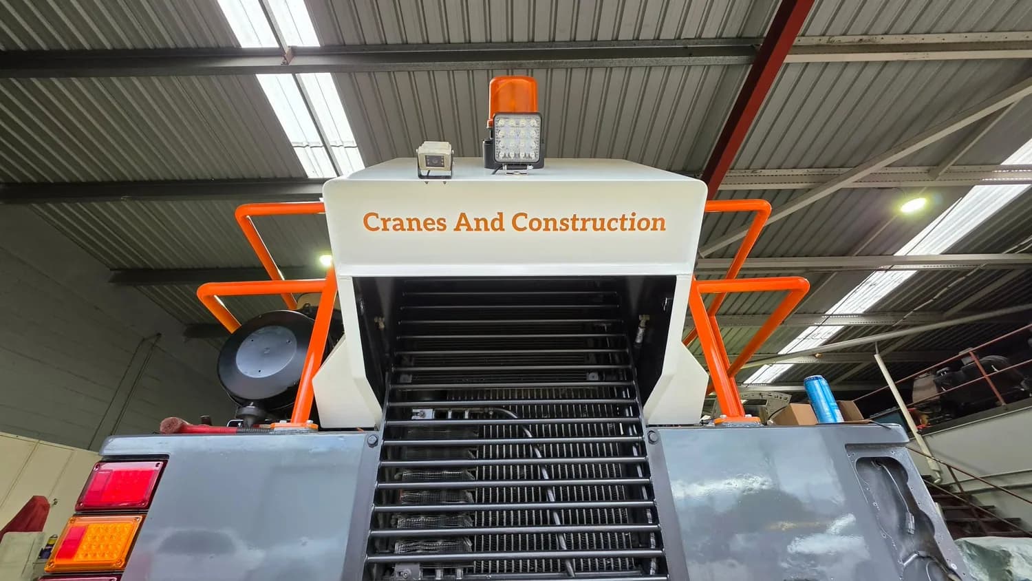 Cranes And Construction crane rear branding in workshop