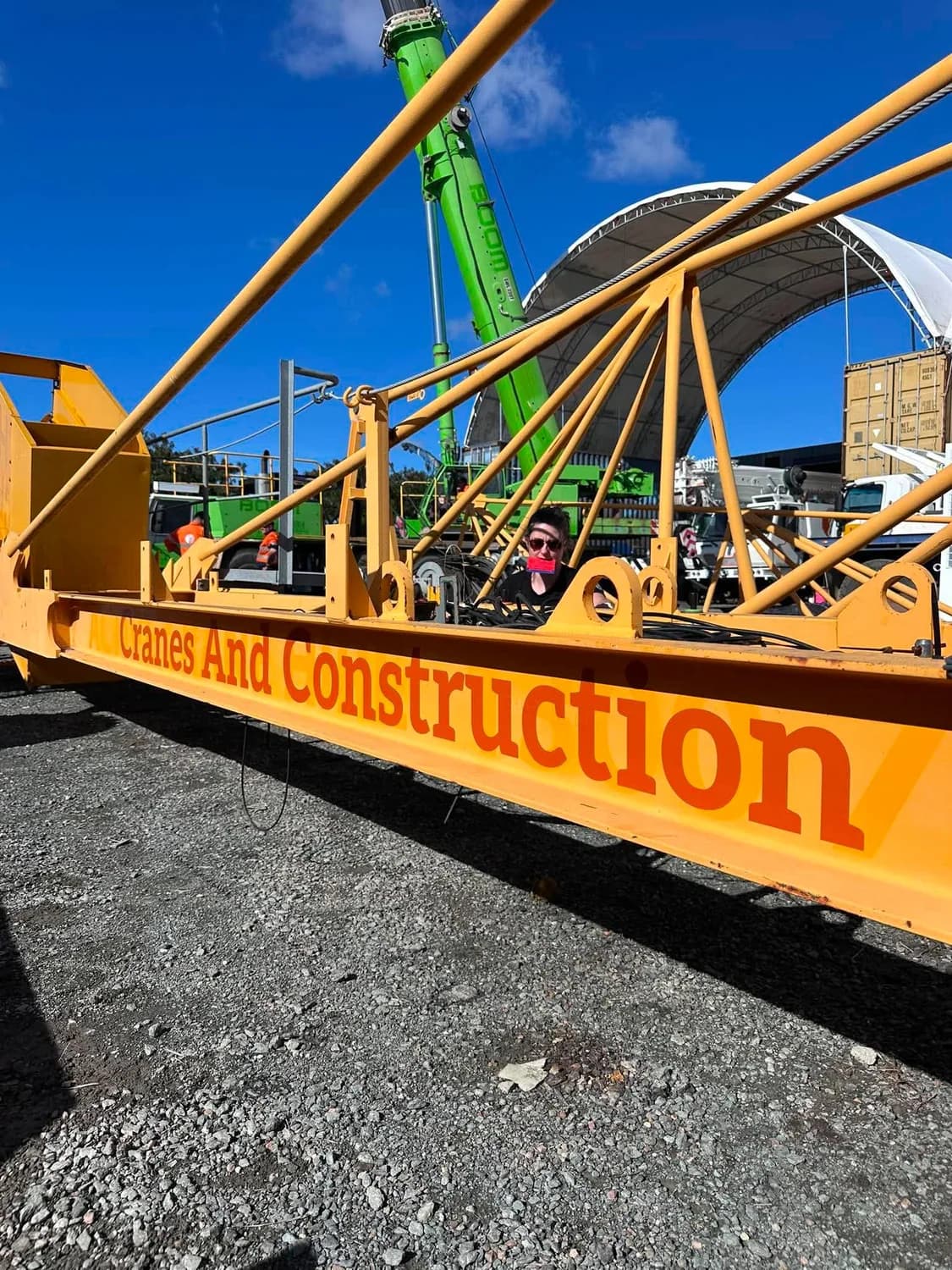 Orange crane/construction plant signage