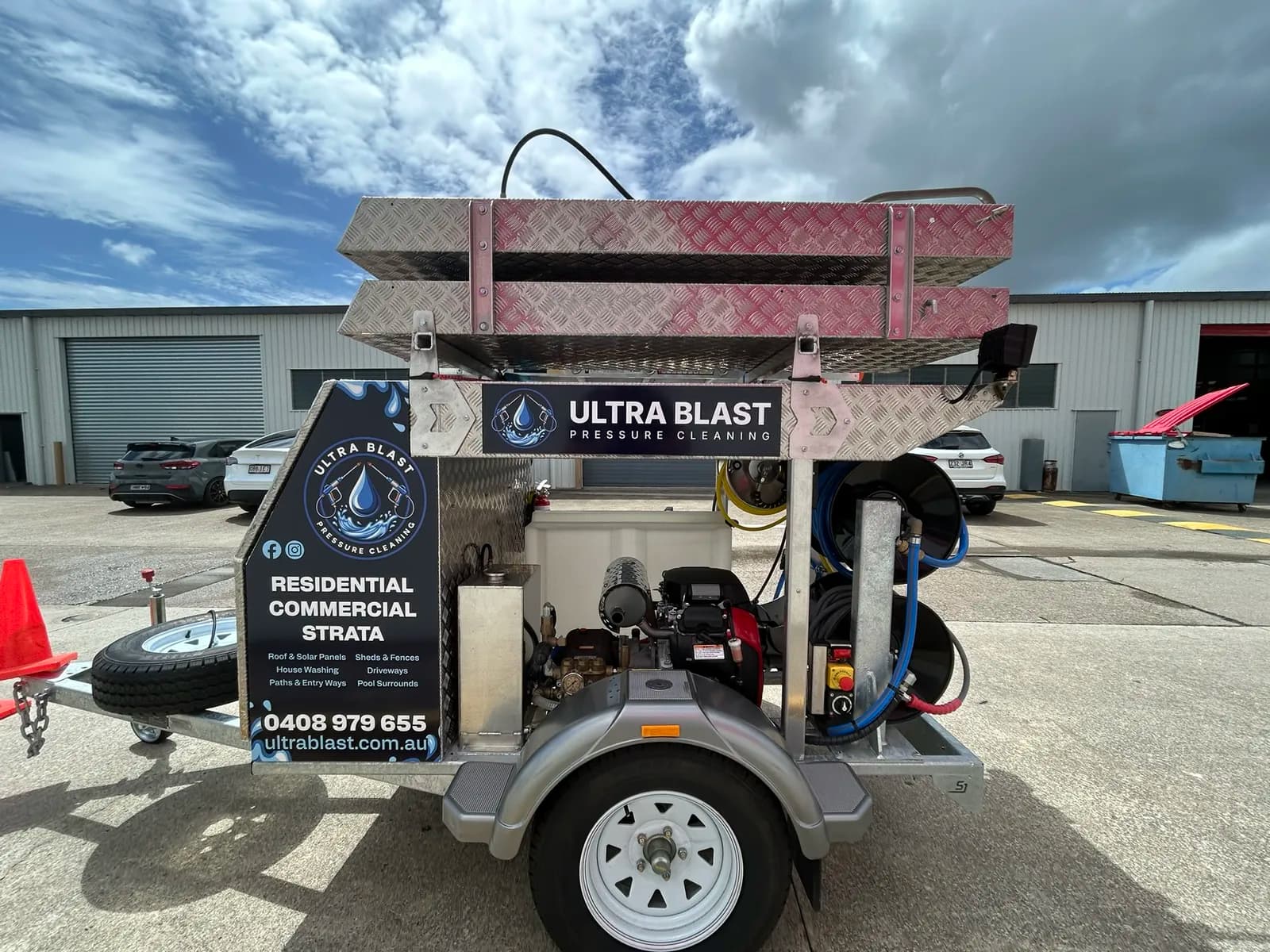 Ultra Blast trailer side view with ladders