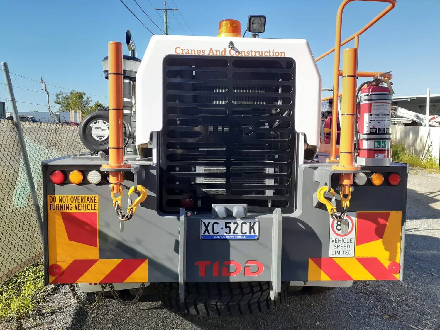 Rear of Cranes And Construction truck, reflective chevron markings and tail lift