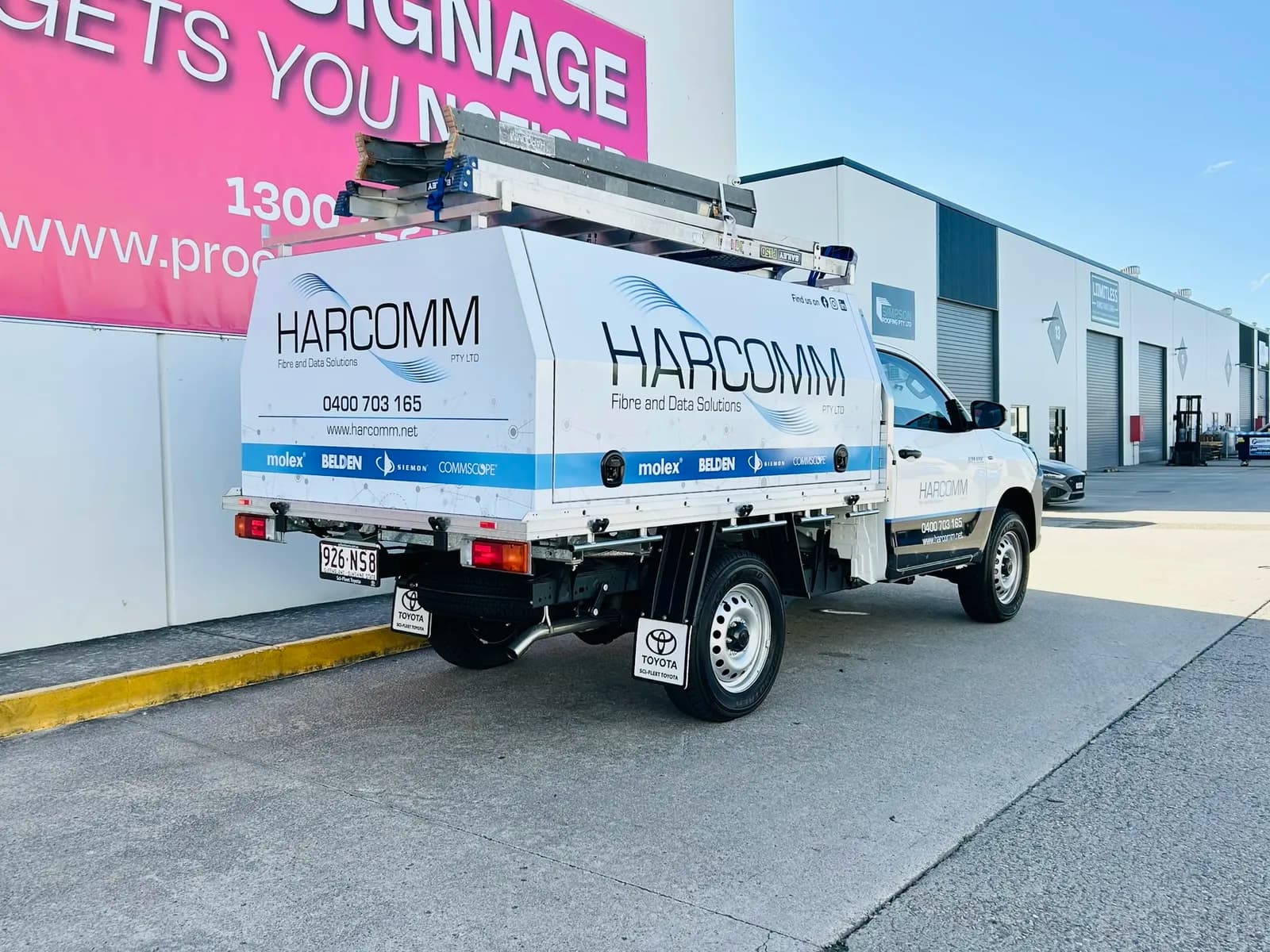 Harcomm Hilux canopy rear three-quarter with ladders