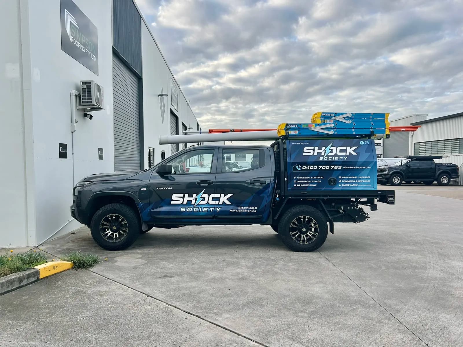Shock Society Triton canopy ute, side profile