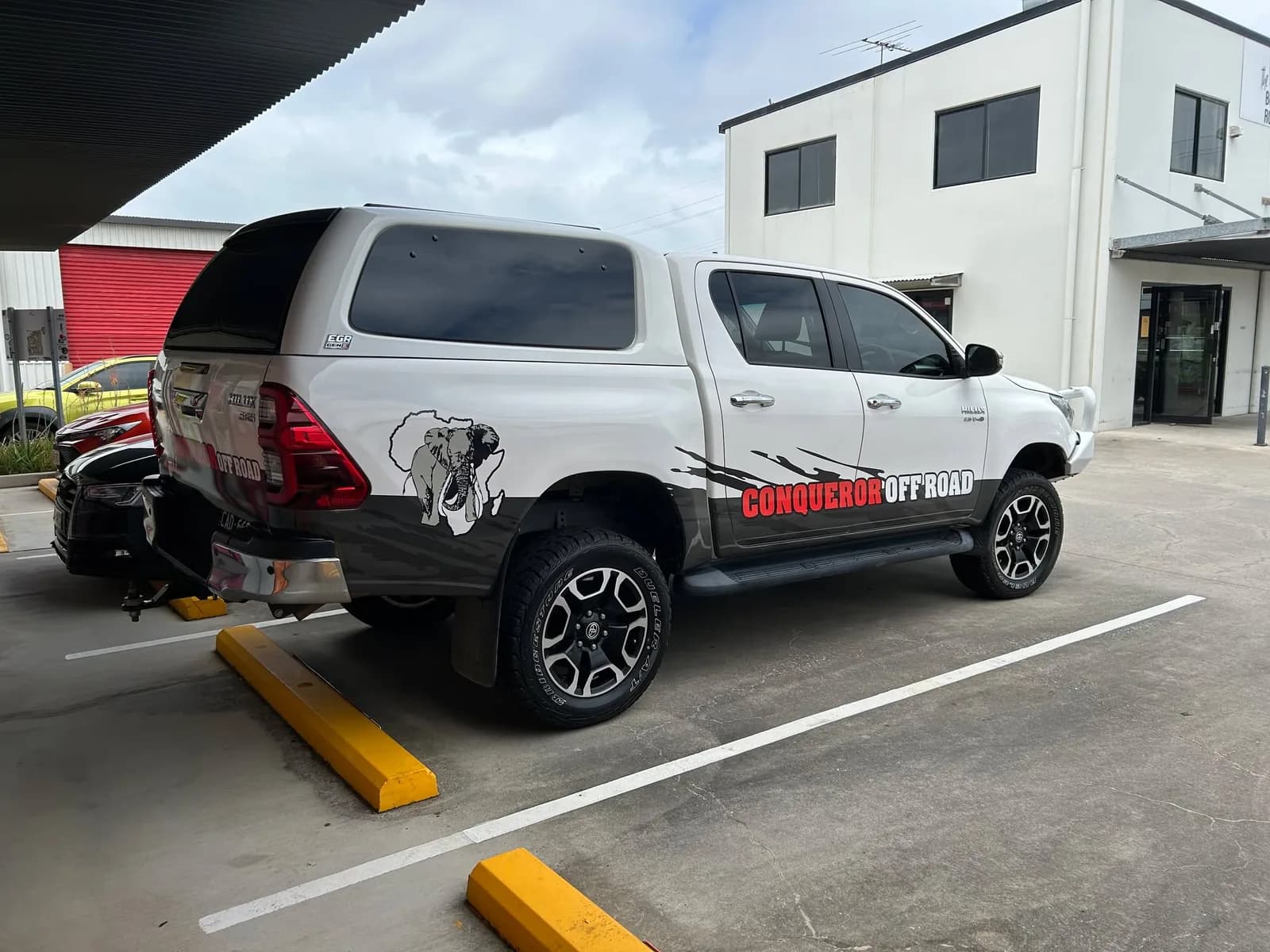 Conqueror Off Road Hilux dual cab canopy with elephant graphic, rear three-quarter
