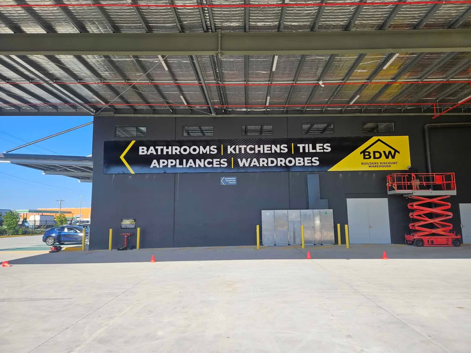 BDW warehouse banner sign listing departments