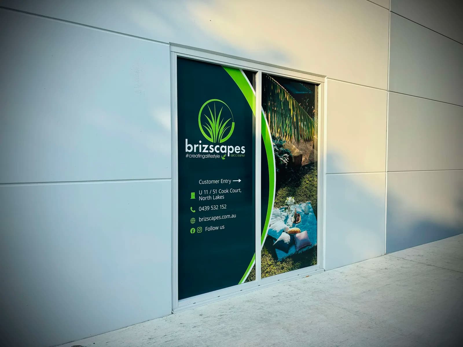 Brizscapes printed entry graphics at a unit door