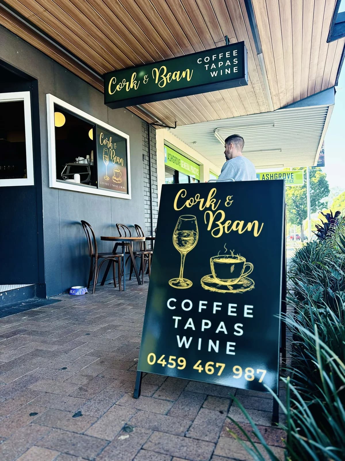 Cork & Bean illuminated under-awning sign and A-frame