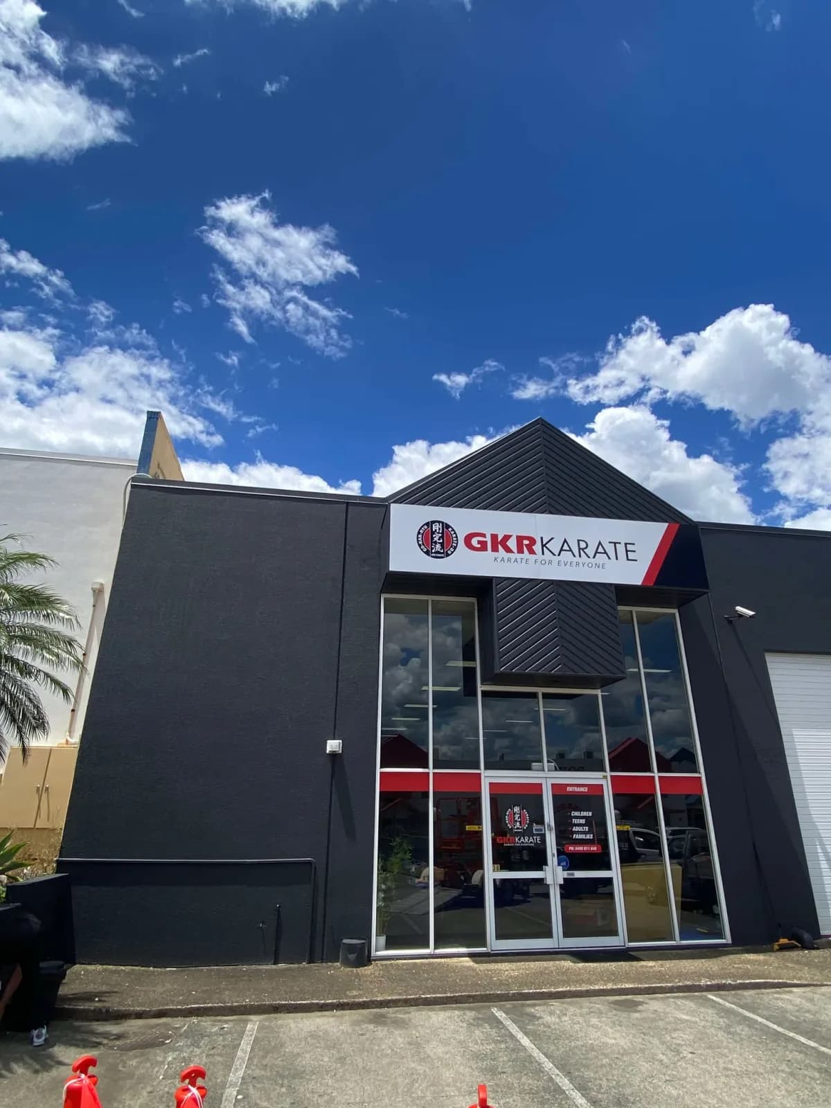 GKR Karate fascia signage on a dark building