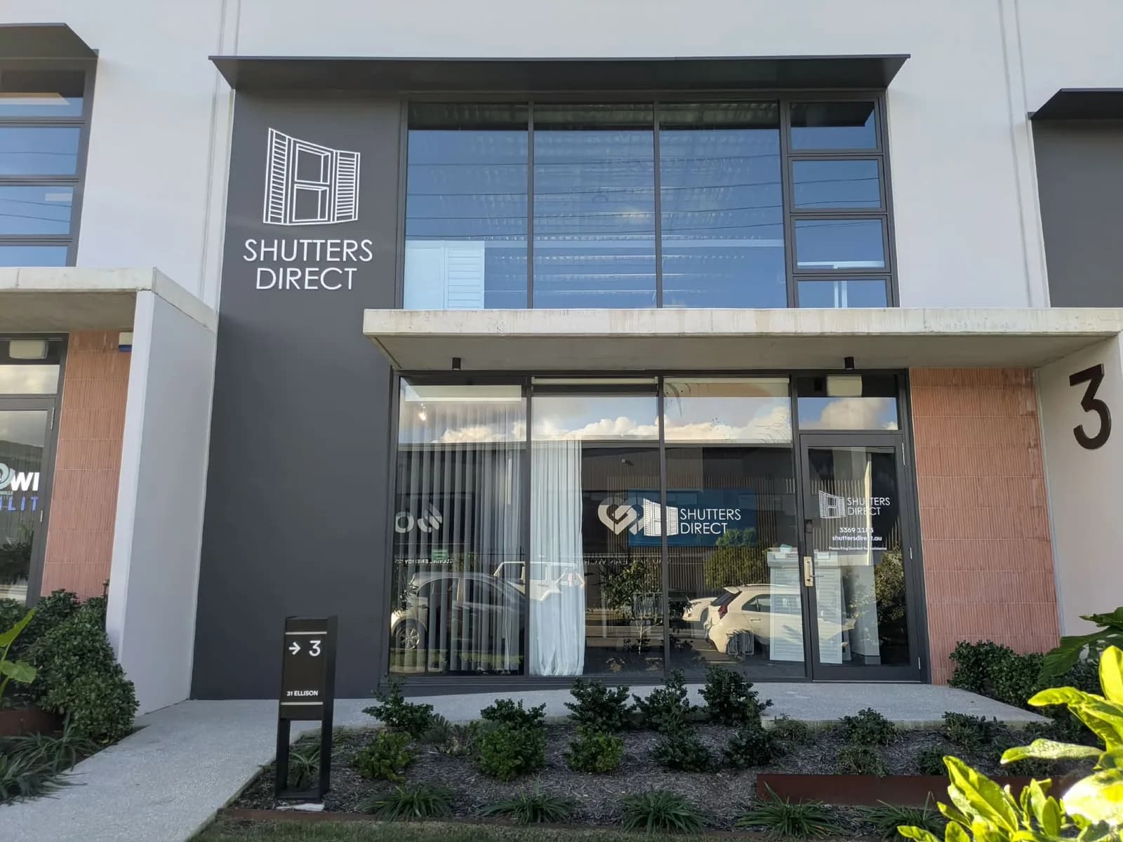 Shutters Direct 3D letters and logo on a dark building fascia