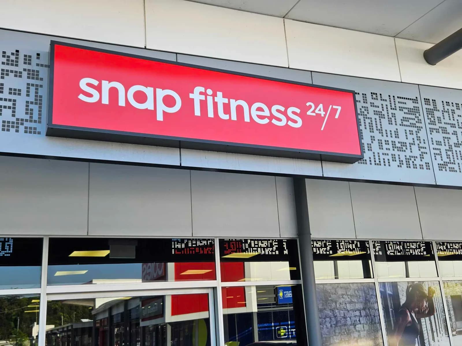 Snap Fitness 24/7 illuminated red fascia sign