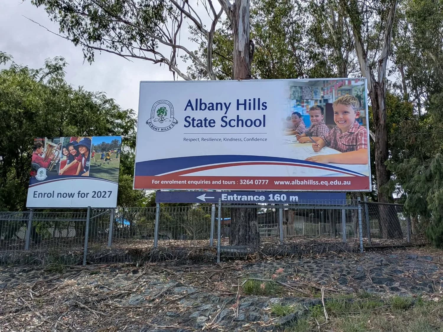 Freestanding roadside school sign, Albany Hills State School enrolment