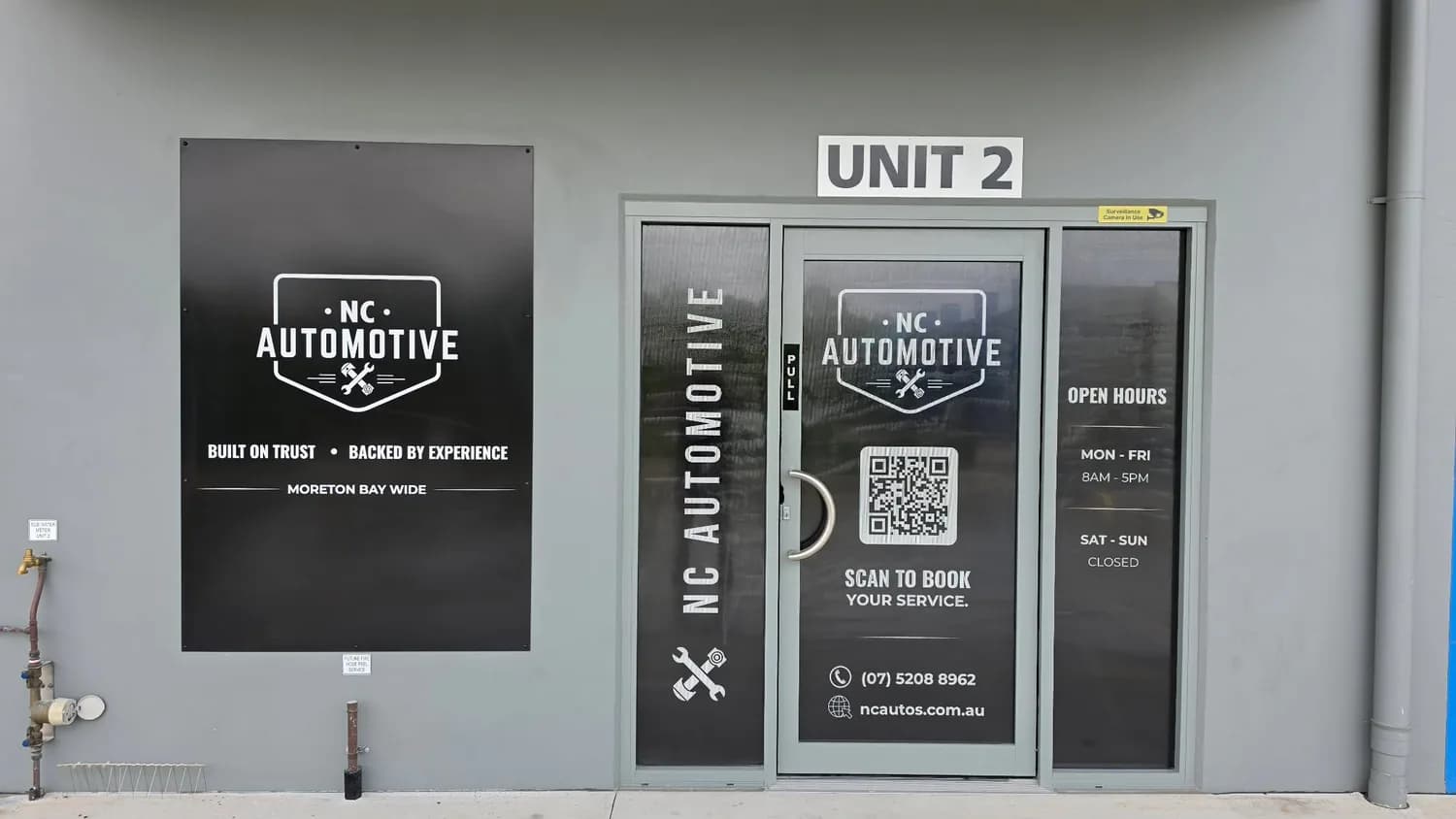 NC Automotive printed graphics on Unit 2 glass doors