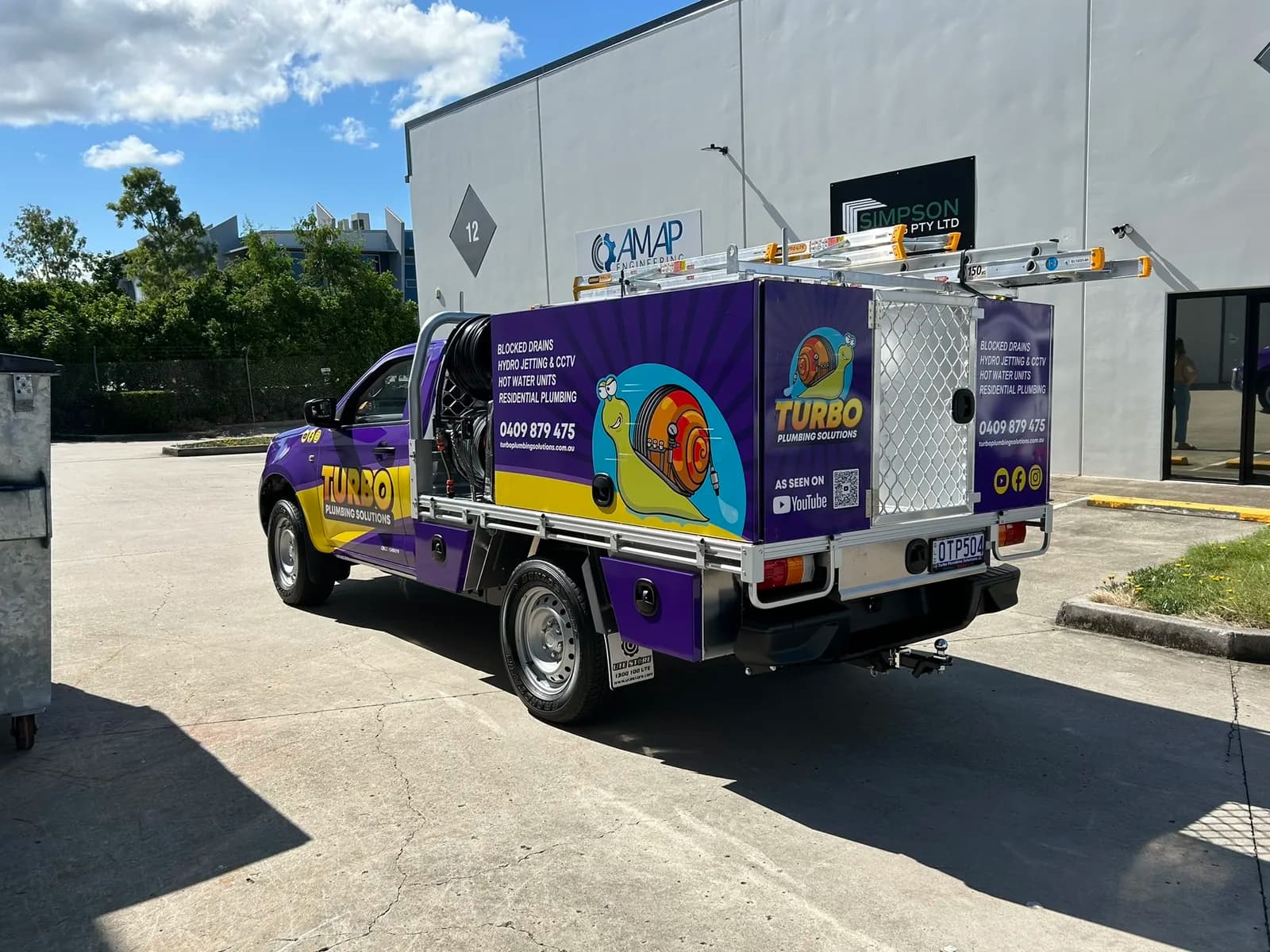 Turbo Plumbing ute rear three-quarter, snail mascot