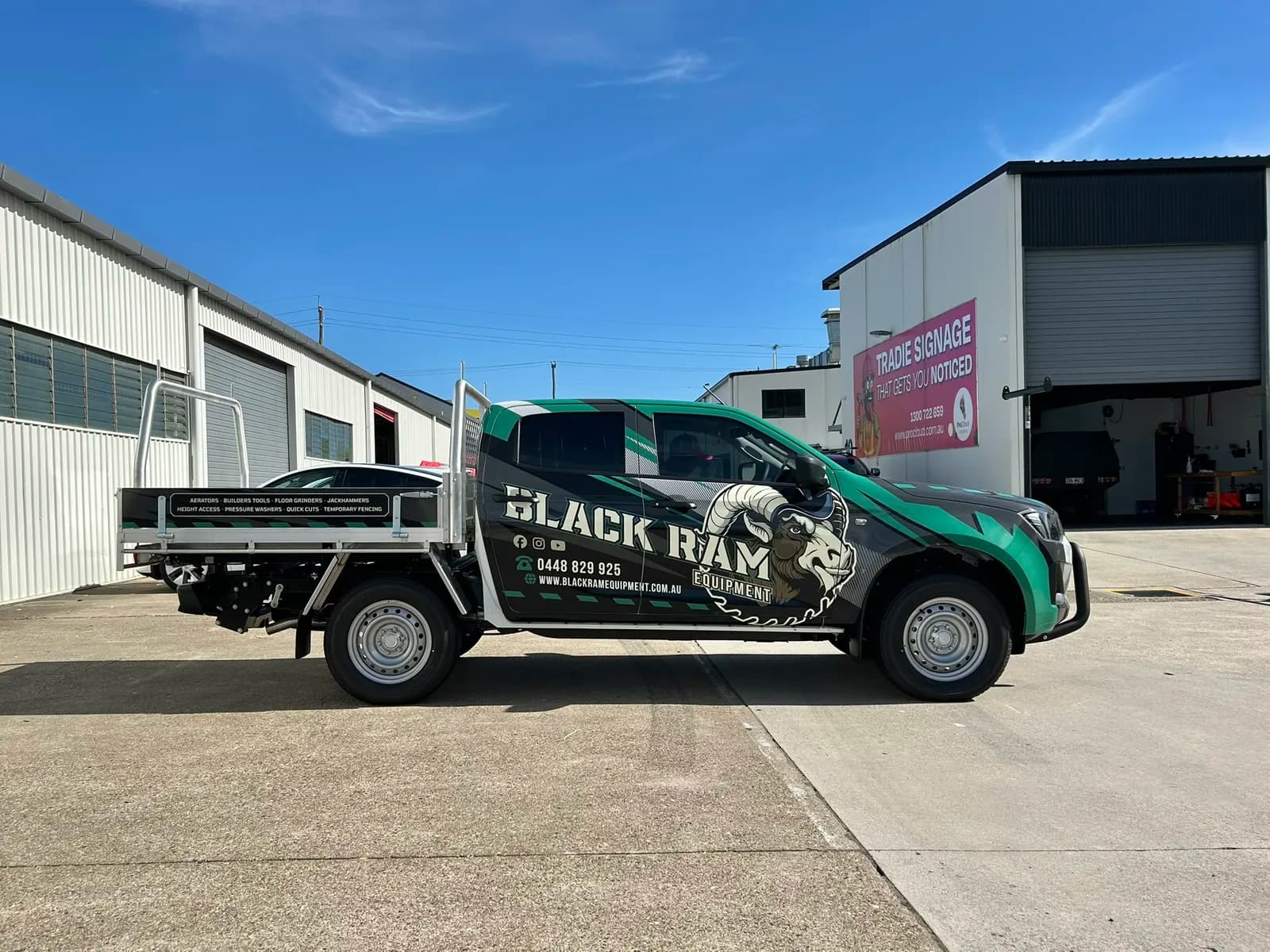 Black Ram Equipment ute side profile, ram mascot