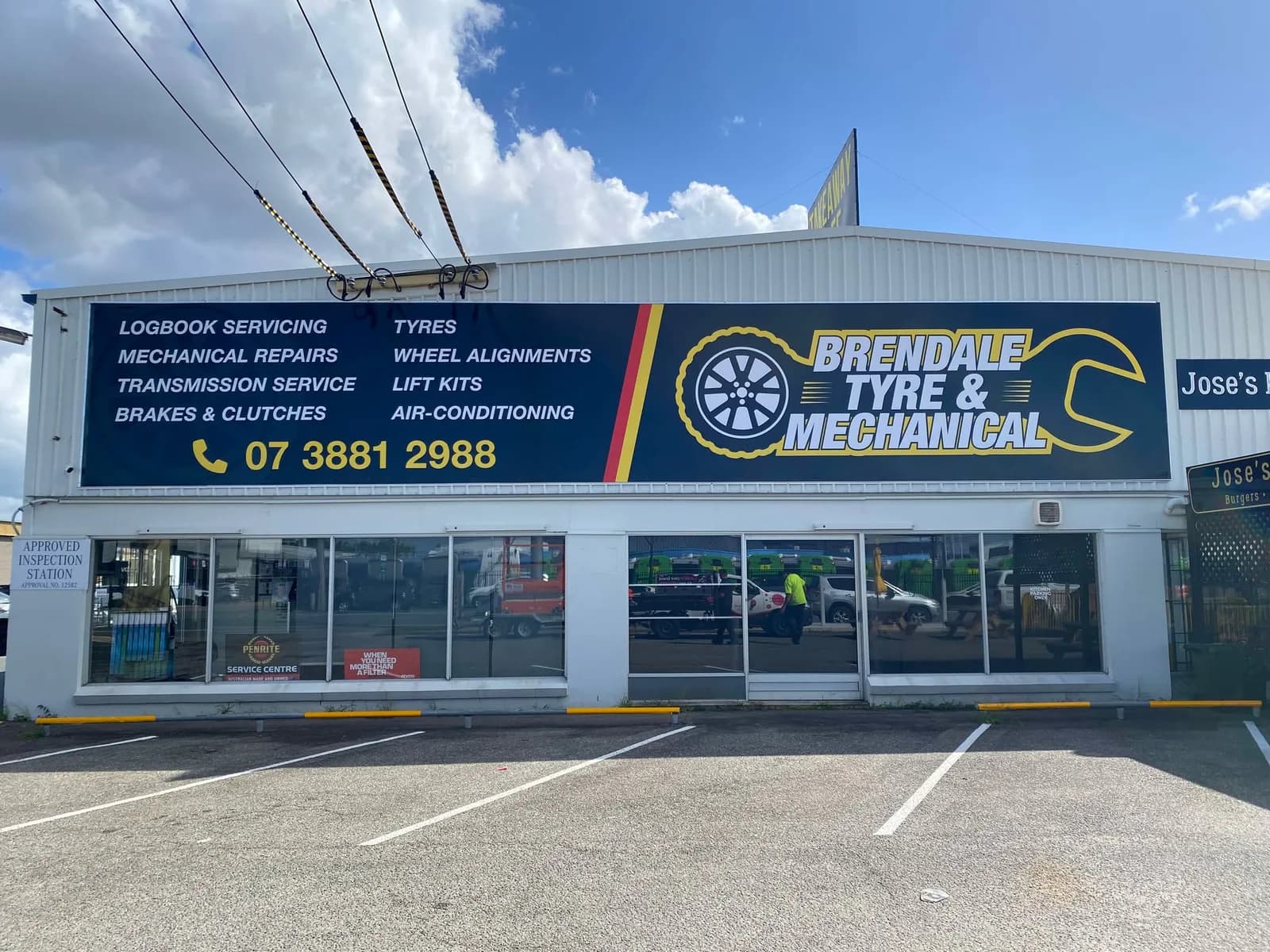 Brendale Tyre & Mechanical fascia sign with service list