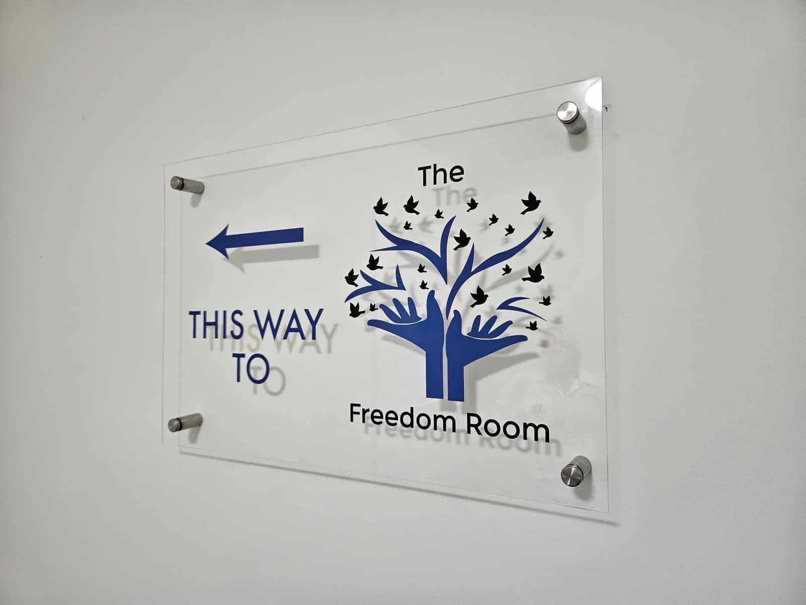 Acrylic standoff wayfinding sign, The Freedom Room