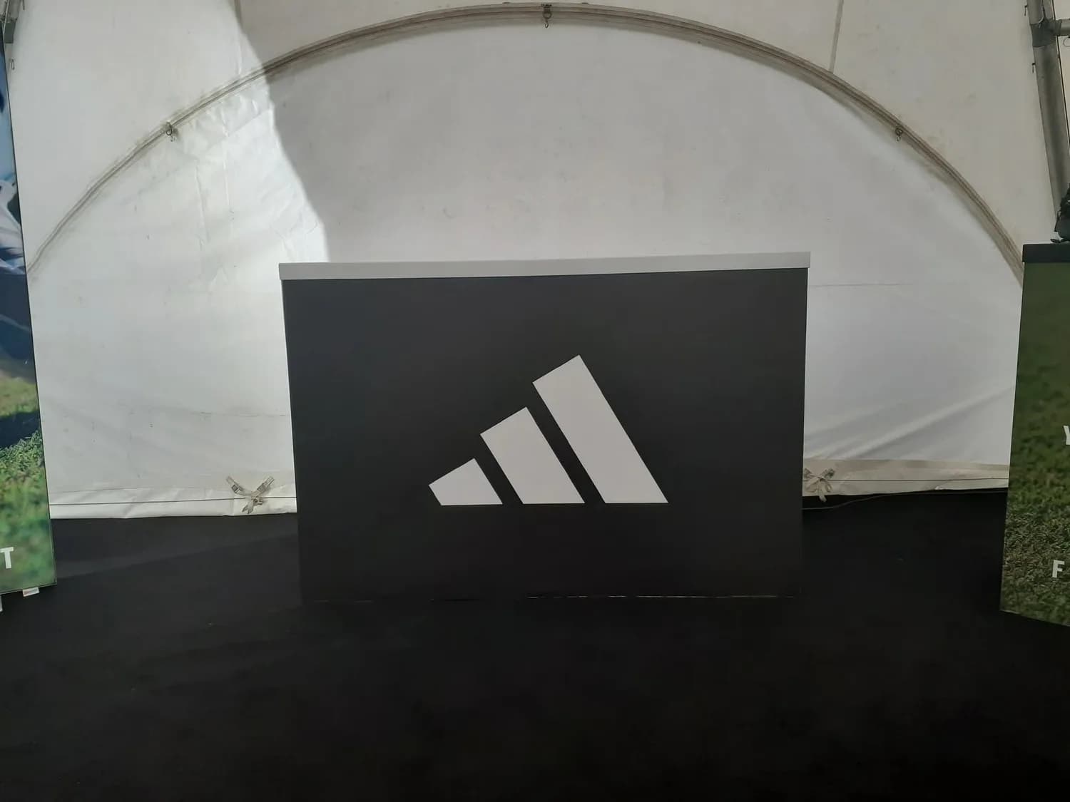 Interior adidas branded wall wrap inside marquee fit-out