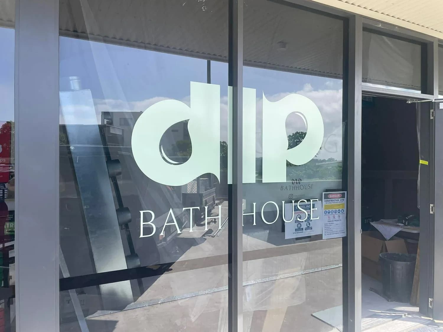dip Bath House window graphics on glass storefront