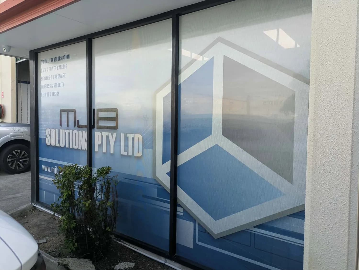 MJB Solutions Pty Ltd window graphics on storefront glass